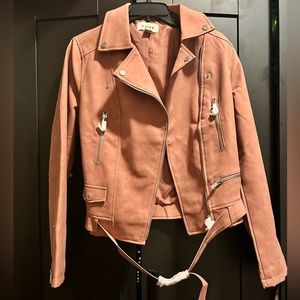 Faux leather moto jacket featuring multiple pockets & quilted detailing.